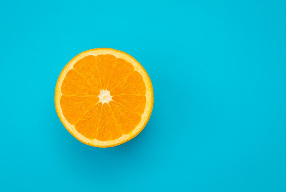 Sliced orange on blue backgroundmrs