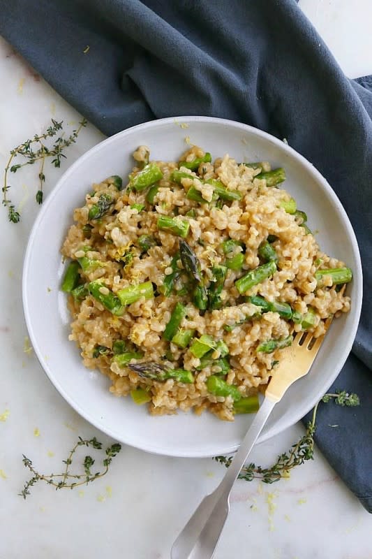 <p>It's a Veg World After All</p><p>This oven-baked brown rice risotto is a creamy, delicious dish that doesn’t require the constant stirring needed for traditional risotto. With asparagus, thyme and lemon, it’s a comforting vegetarian meal for the early spring!</p><p><strong>Get the recipe: <a href="https://itsavegworldafterall.com/baked-brown-rice-risotto-with-asparagus/" rel="nofollow noopener" target="_blank" data-ylk="slk:Baked Brown Rice Risotto with Asparagus;elm:context_link;itc:0;sec:content-canvas" class="link ">Baked Brown Rice Risotto with Asparagus</a></strong></p>