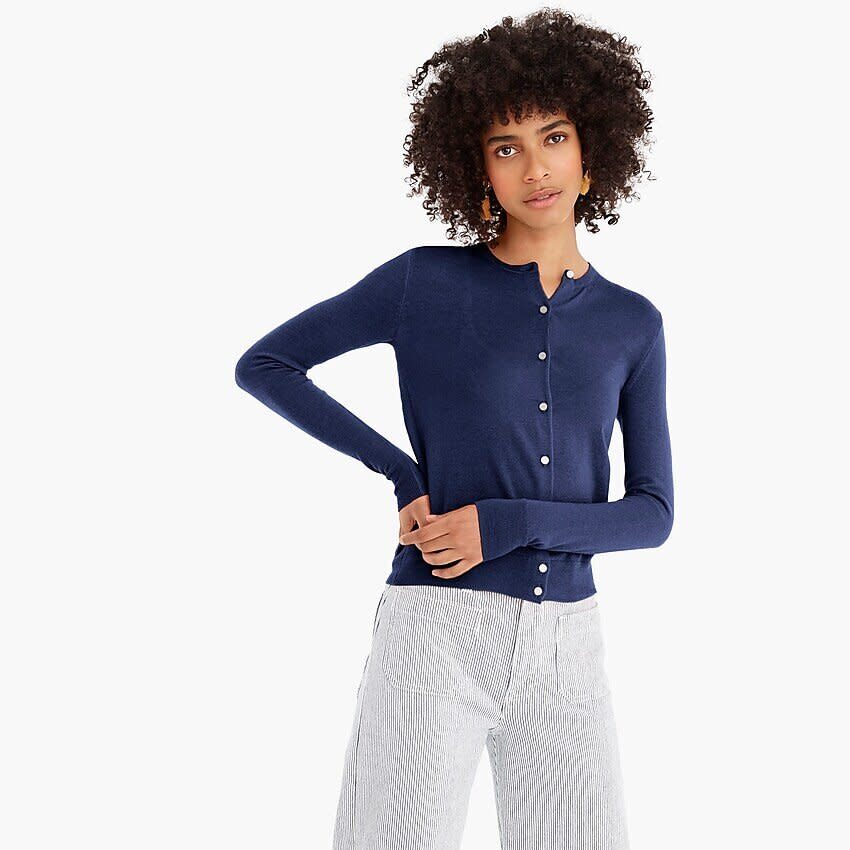 Get the <a href="https://www.jcrew.com/p/womens_category/sweaters/cardigan/featherweight-cashmere-cardigan-sweater/K5262?color_name=navy" target="_blank" rel="noopener noreferrer">J.Crew featherweight cashmere cardigan sweater for $128</a>.