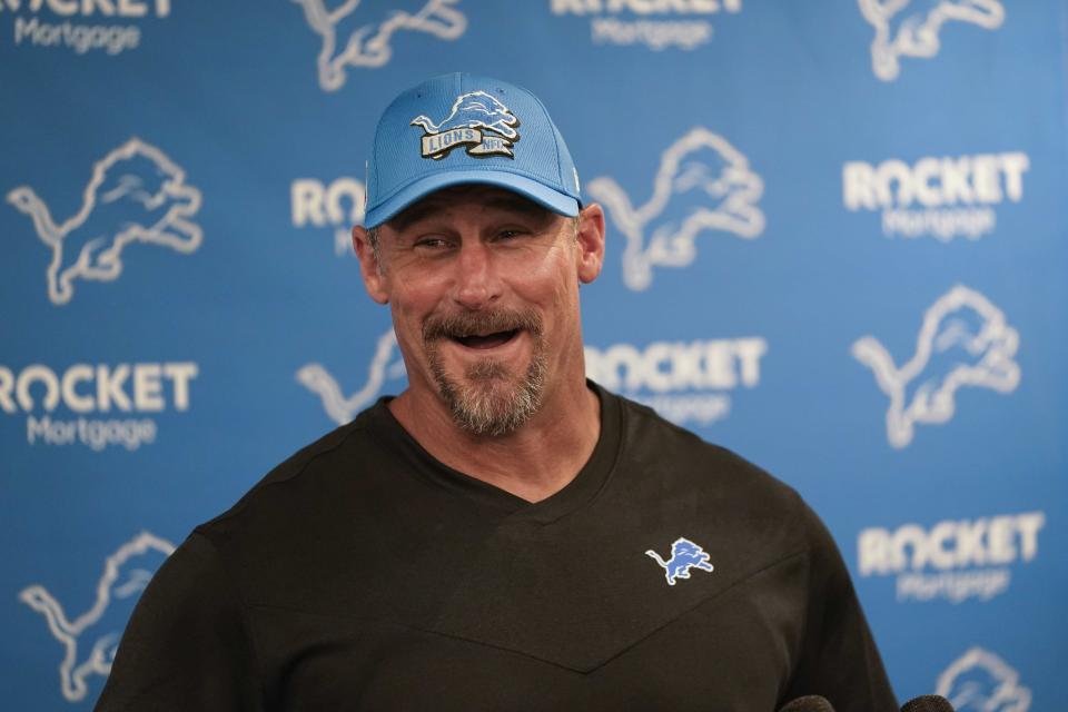 Washington Commanders head coach Ron Rivera quarterback Carson Wentz talks with the media after an NFL football game against the Detroit Lions in Detroit, Sunday, Sept. 18, 2022. (AP Photo/Paul Sancya)