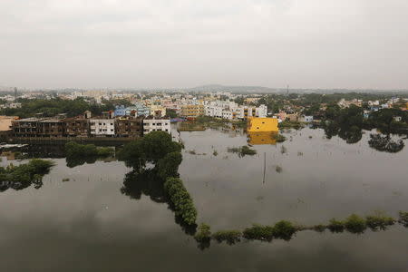 An aerial view shows a flooded residential colony in Chennai, India, December 6, 2015. REUTERS/Anindito Mukherjee