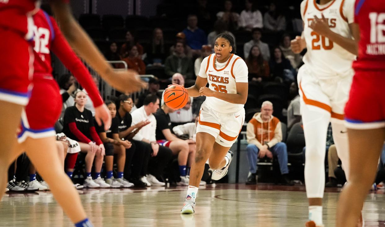 Texas Longhorns forward Madison Booker (35) brings the ball down for her team in the second half of the Longhorns' game against the Kansas Jayhawks at the Moody Center in Austin, Jan 16, 2024. Texas won the game 91-56.