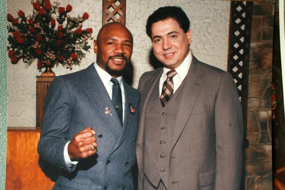 Monte Ferris Sr., right, with boxing great "Marvelous" Marvin Hagler at the Venus de Milo. The Venus de Milo serves more people for Thanksgiving than most of us can imagine.