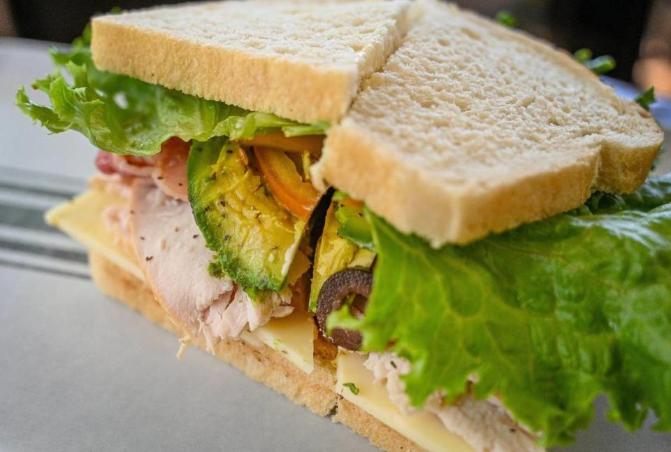 A turkey, bacon avocado sandwich is stacked high at Downtown Oak, which recently opened in the Hotel Virginia Building at the corner of Kern and L streets in downtown Fresno.