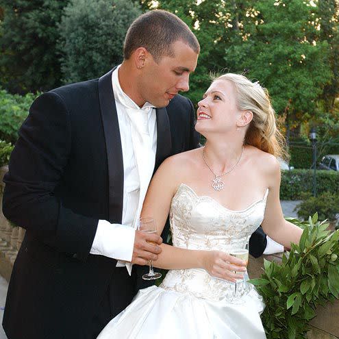 ABC Family Mark Wilkerson and Melissa Joan Hart celebrate their wedding on July 19, 2003