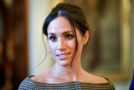 <p>Meghan wears gold star earrings from Tutti & Co. while visiting Cardiff Castle on Jan. 18, 2018. (Photo: Ben Birchall/AFP/Getty Images) </p>