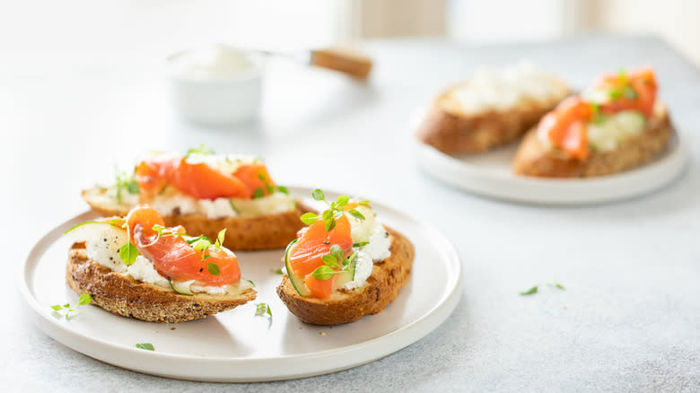 Salmon cheese crostinis on plate