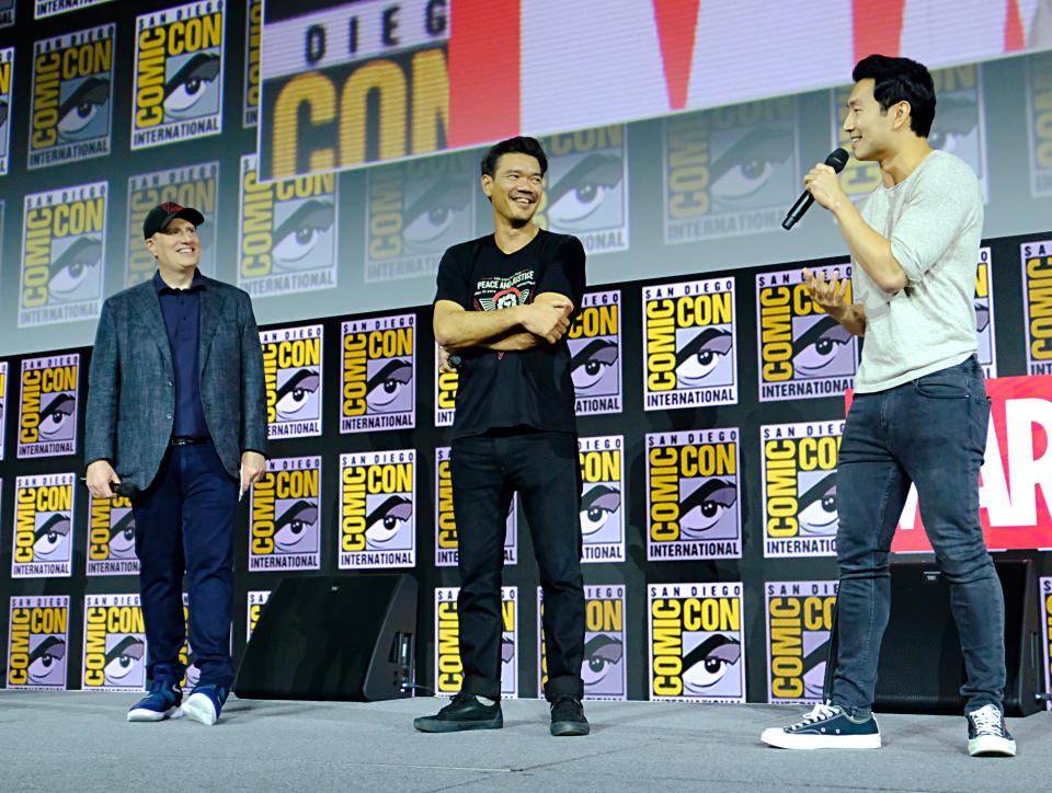 SAN DIEGO, CALIFORNIA - JULY 20: (L-R) President of Marvel Studios Kevin Feige, Director Destin Daniel Cretton and Simu Liu of Marvel Studios' 'Shang-Chi and the Legend of the Ten Rings' at the San Diego Comic-Con International 2019 Marvel Studios Panel in Hall H on July 20, 2019 in San Diego, California. (Photo by Alberto E. Rodriguez/Getty Images for Disney)