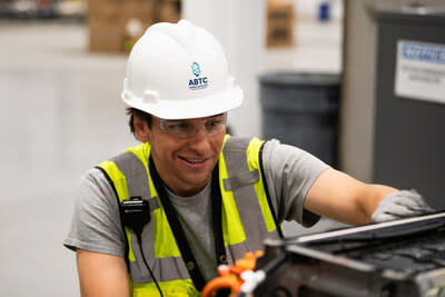 An employee from the American Battery Technology Company inspects a battery at the company’s lithium-ion battery recycling facility located in the Tahoe-Reno Industrial Center in Storey County, Nevada.  The company was awarded a $20 million tax credit through a competitive U.S. Department of Energy process which will support the advancement of this facility and provide capital expenditures to accelerate deployment of the company's next phase of critical battery minerals manufacturing.