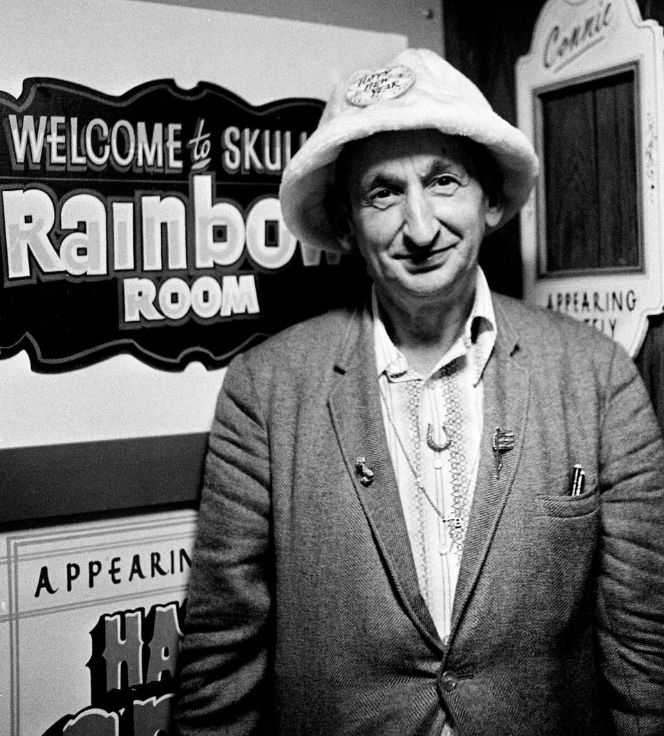 David "Skull" Schulman, operator of the Rainbow Room in Printer’s Alley, stands outside his club Dec. 30, 1972, where the police raids have turned his strip tease acts into more tease and less strip.