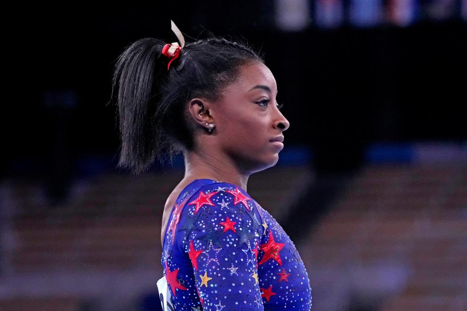 "We have to protect our mind and our body rather than just go out there and do what the world wants us to do,” Simone Biles says.