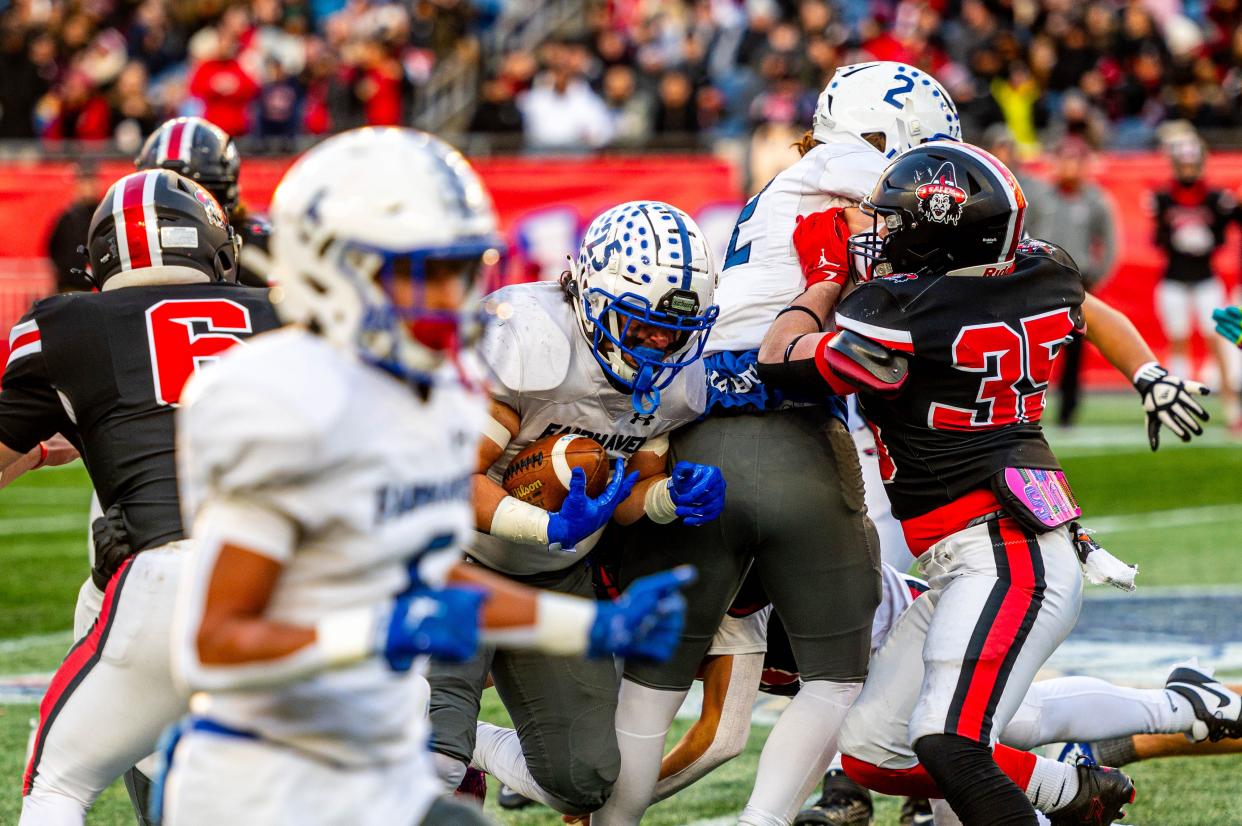 Fairhaven's Justin Marques powers forward in the MIAA Division 6 Super Bowl against Salem.