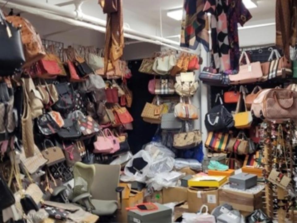This photo provided by the U.S. Attorney for the Southern District of New York shows counterfeit goods from a storage unit in New York (AP)