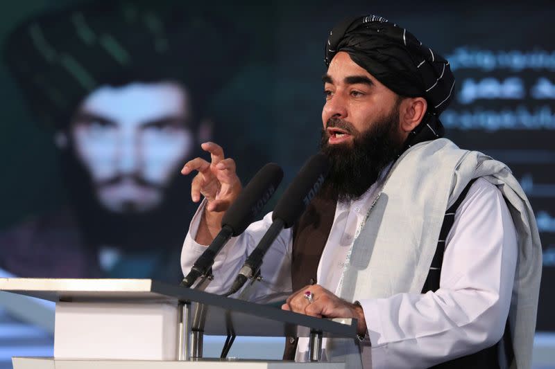 Afghan Taliban's Deputy Minister of Information and Culture and spokesman Zabihullah Mujahid speaks during the death anniversary of Mullah Mohammad Omar, the late leader and founder of the Taliban, in Kabul