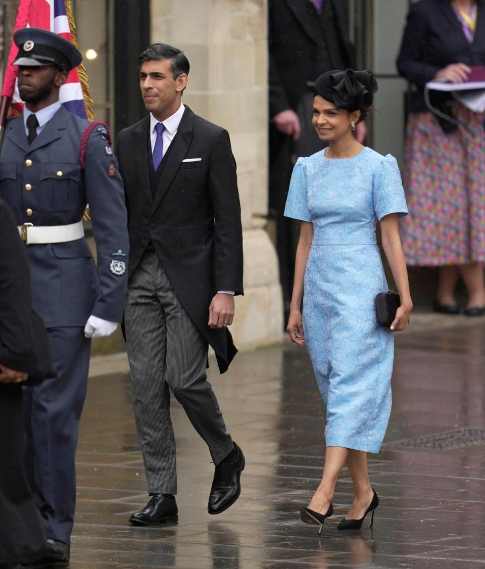 Prime minister Rishi Sunak and his wife Akshata Murthy arrive at Westminster Abbey (AP)