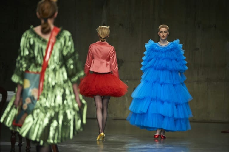 Models present creations by British designer Molly Goddard during London Fashion Week