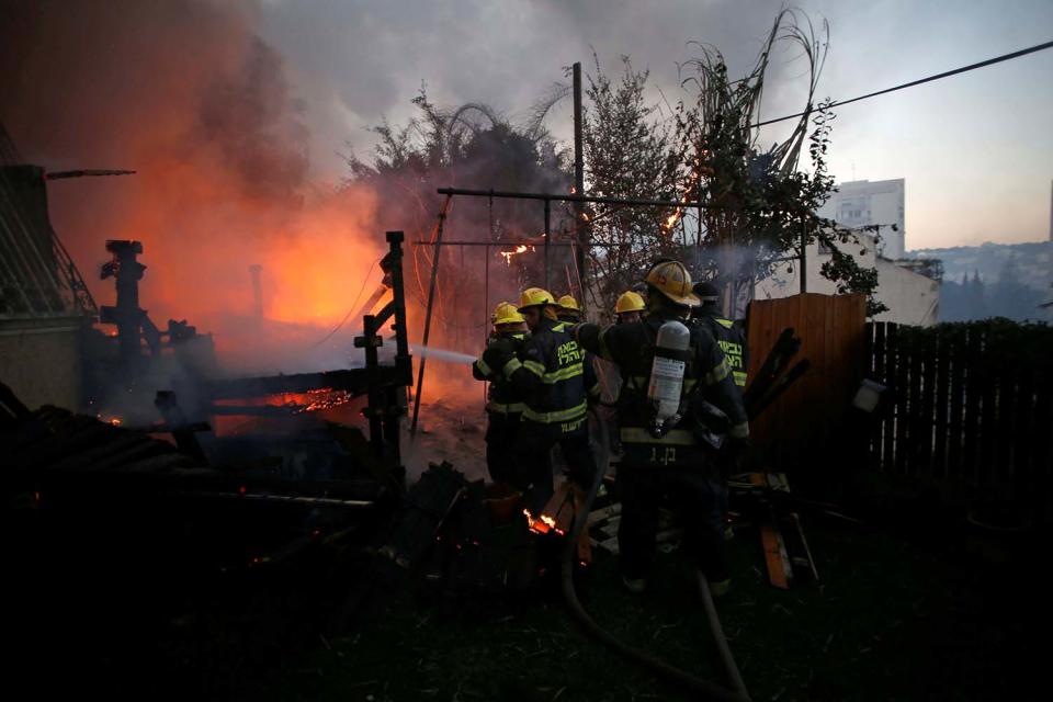 Massive wildfires tear across Israel