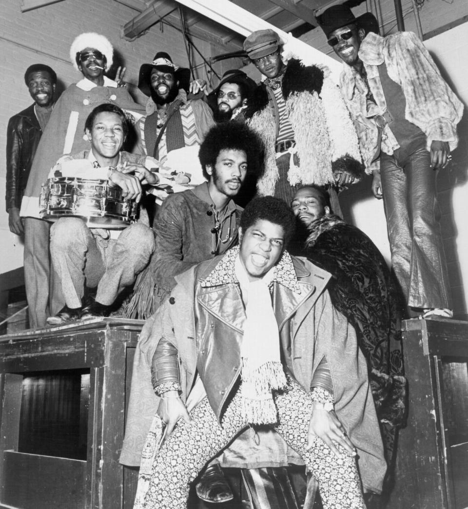 CIRCA 1974: (Top row, L-R) Ray Davis, Cavin Simon, Grady Thomas, Fuzzy Haskins, Tawl Ross, Bernie Worrell, (bottom row L-R) Tiki Fulwood, Eddie Hazel, George Clinton, Billy "Bass" Nelson of the funk band Parliament-Funkadelic pose for a portrait in circa 1974. (Photo by Michael Ochs Archives/Getty Images)