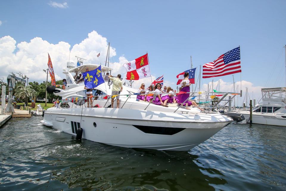 Dozens of boats and hundreds of people join in a previous Fiesta Boat Parade. This year's events get underway Saturday.