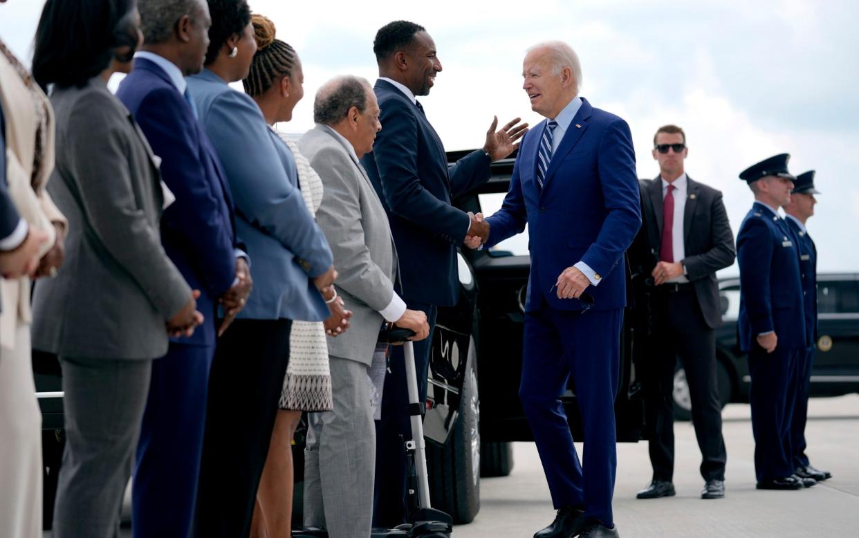 Atlanta Mayor Andre Dickens greets President Joe Biden