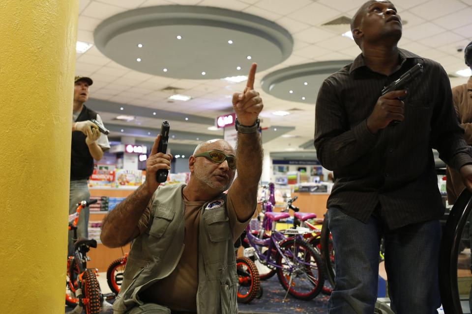 Security officers secure an area inside Westgate Shopping Centre in Nairobi