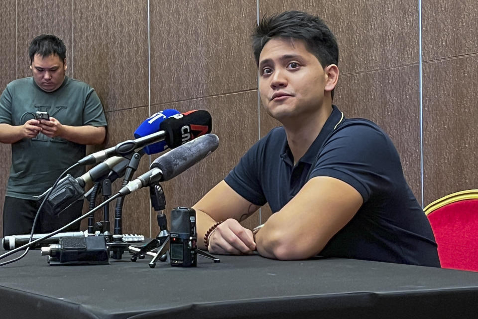 Singapore's Joseph Schooling announces his retirement from swimming at a press conference in Singapore, Tuesday, April 2, 2024. Schooling, who beat Michael Phelps in the 100-meter butterfly to win Singapore's first and only Olympic gold medal at Rio de Janeiro in 2016, announced his retirement on Tuesday. (AP Photo/Steve J. Moore)