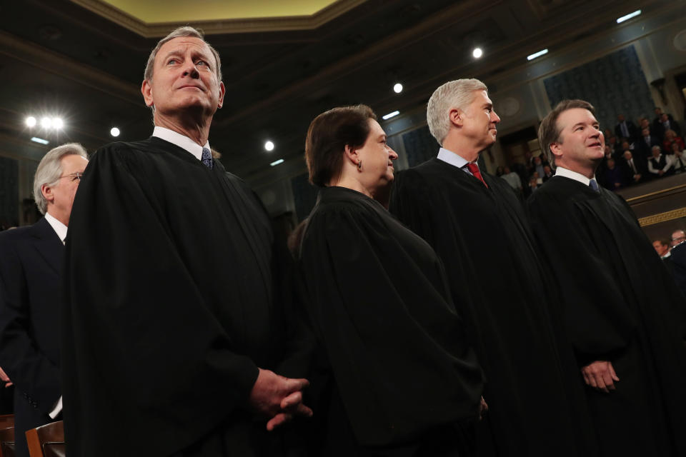 From left, Supreme Court Chief Justice John Roberts, Associate Justice Elena Kagan, Associate Justice Neil Gorsuch and Associate Justice Brett Kavanaugh, before President Donald Trump delivers his State of the Union address to a joint session of Congress in the House Chamber on Capitol Hill in Washington, Tuesday, Feb. 4, 2020. (Leah Millis/Pool via AP)