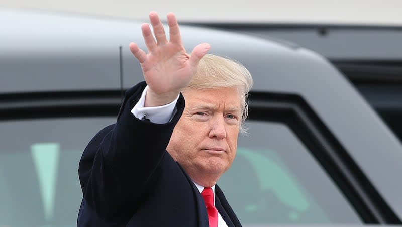 Then-President Donald Trump waves to the crowd at Roland R. Wright Air National Guard Base at the Salt Lake City International Airport in Salt Lake City on Monday, Dec. 4, 2017. Trump will come to Utah on June 27, 2024, to fundraise for his reelection campaign.