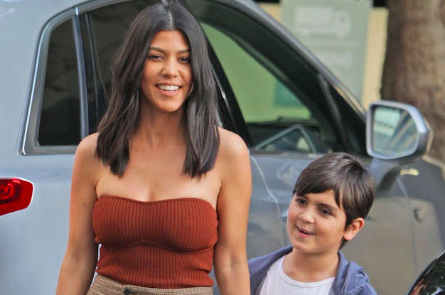 Kourtney Kardashian with her son, Mason. [Photo: Splash]