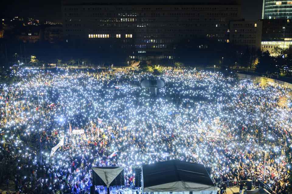 People gather to take part in a protest against the government, in Bratislava, Friday, March 15, 2024. Thousands of Slovaks have rallied in the capital to condemn a plan by the new government of populist Prime Minister Robert Fico to overhaul the country’s public broadcasting amid a wave of anti-government protests. (Jaroslav Novak/TASR via AP)