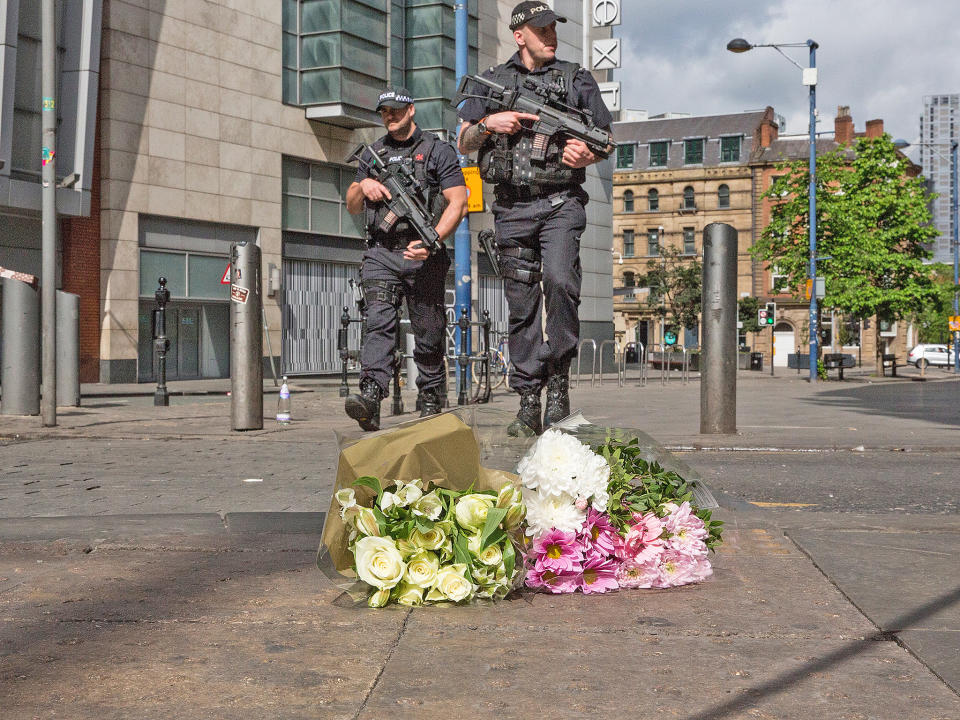 Armed police patrol in Shudehill, Manchester, today: Getty