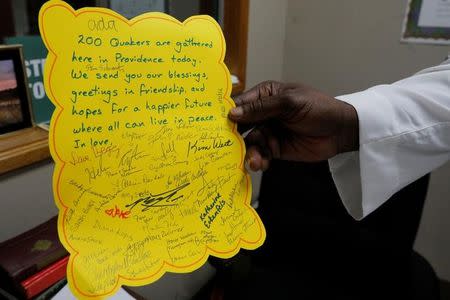 Imam Abdul-Latif Sackor holds a letter of support from local Quakers sent after hate letters were received at the Islamic Center of Rhode Island, Masjid Al-Kareem Mosque in Providence, Rhode Island, U.S., May 4, 2017. Picture taken May 4, 2017. REUTERS/Brian Snyder