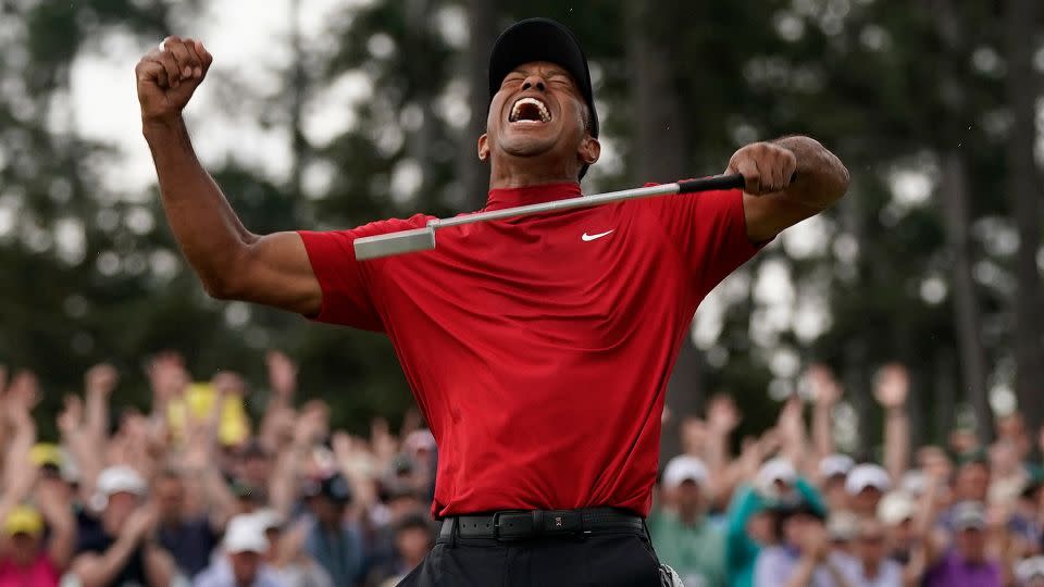 Woods roars after clinching his five Masters title -- and his 15th major championship -- in 2019. - David J. Phillip/AP