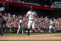 May 25, 2019; San Francisco, CA, USA; San Francisco Giants second baseman Joe Panik (12) scores a run during the seventh inning against the Arizona Diamondbacks at Oracle Park. Mandatory Credit: Sergio Estrada-USA TODAY Sports