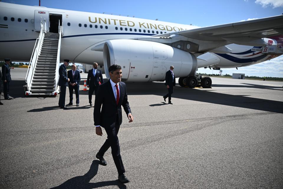 Prime Minister Rishi Sunak walks over the tarmac after landing in Vilnius, Lithuania (Getty Images)
