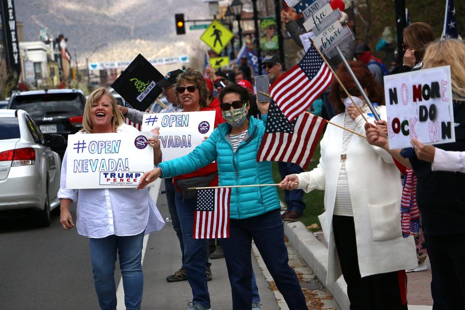 A large crowd gathers for a rally Saturday in Carson City in favor of reopening Nevada's economy.
