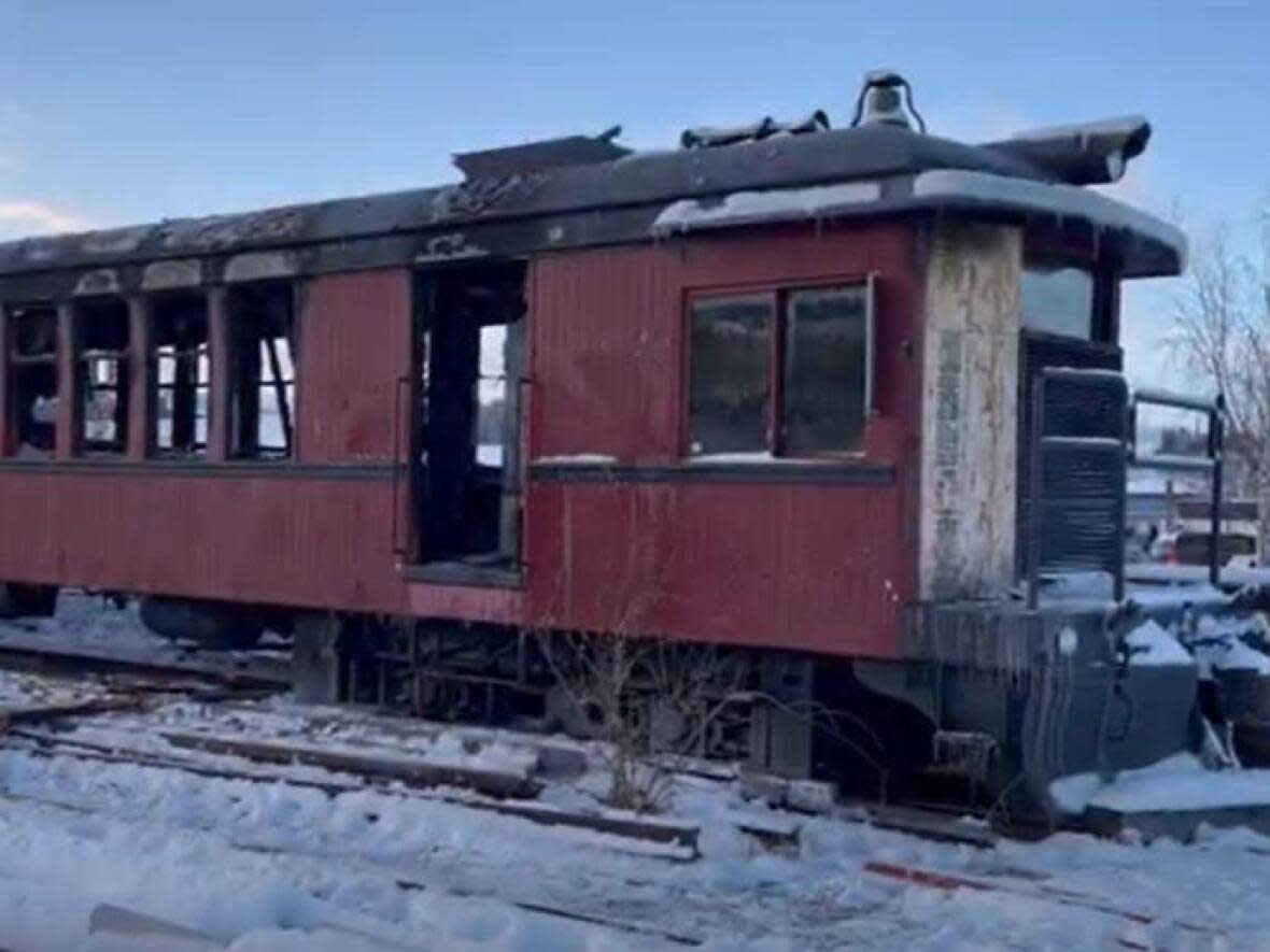 The distinctive rail car sits outside the roundhouse building at Front and Wood Streets. (Wayne Vallevand/CBC - image credit)