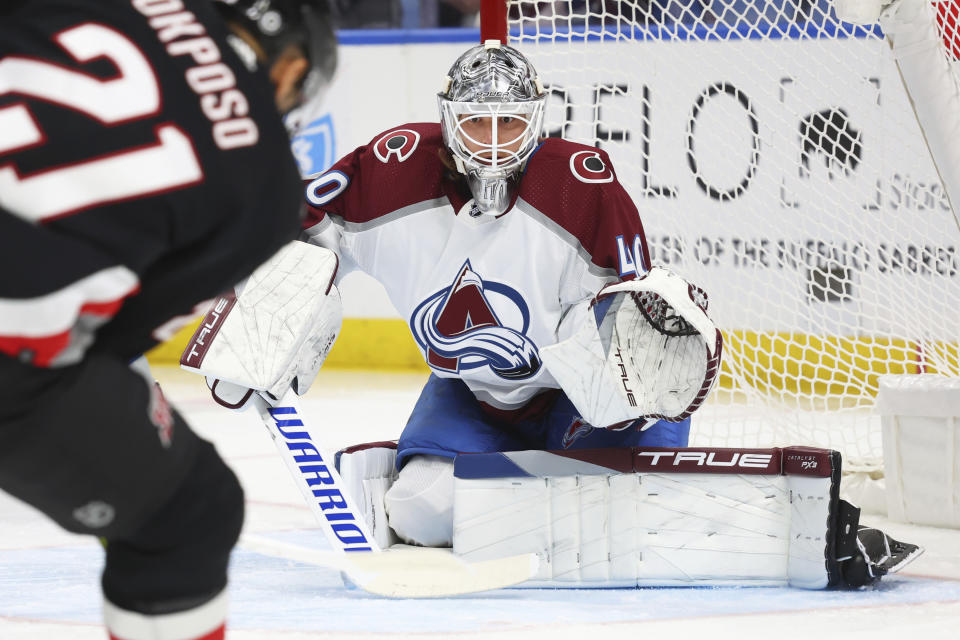 Colorado Avalanche goaltender Alexandar Georgiev (40)keeps his eyes on the puck during the first period of an NHL hockey game against the Buffalo Sabres Sunday, Oct. 29, 2023, in Buffalo, N.Y. (AP Photo/Jeffrey T. Barnes)