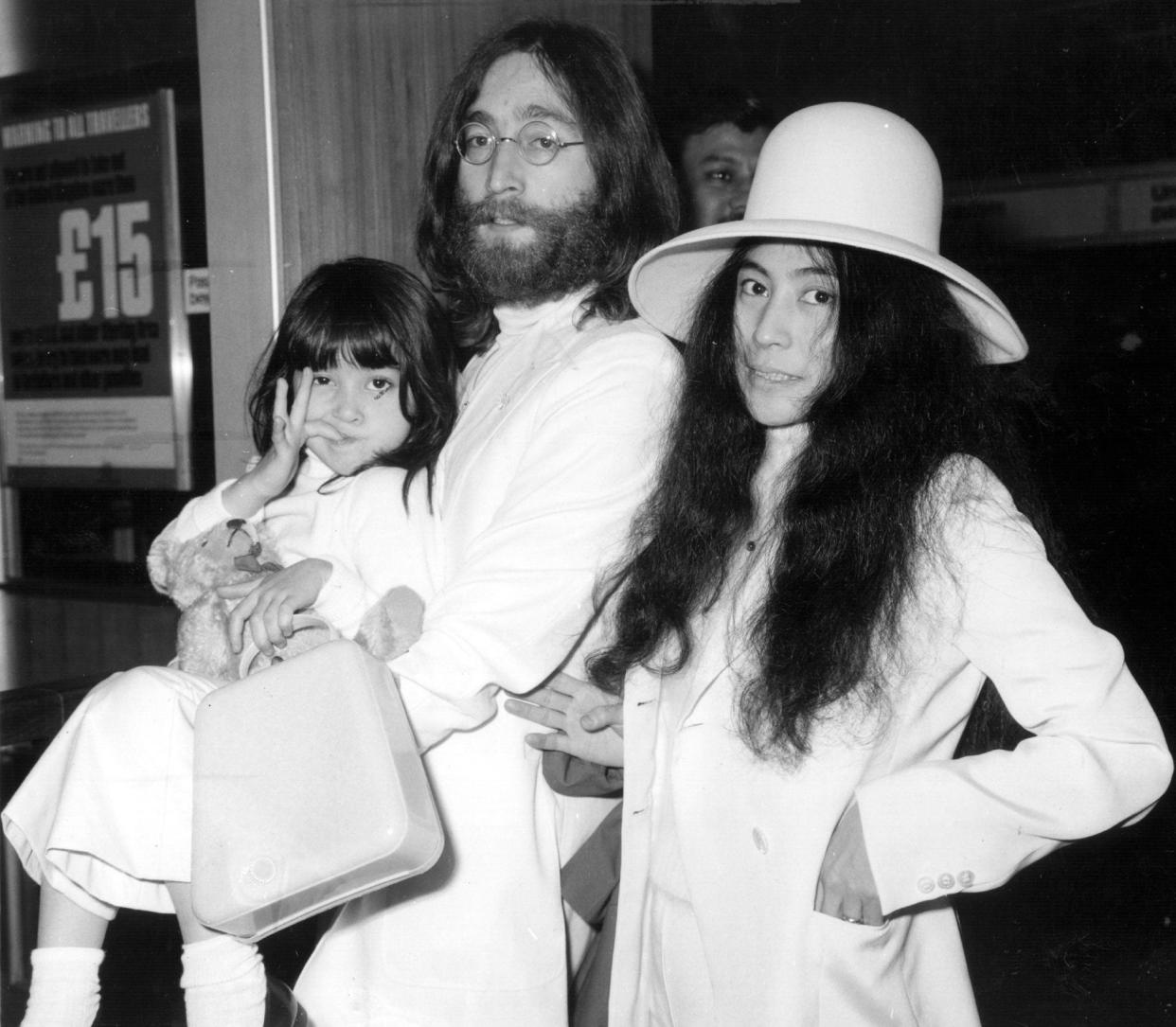 Yoko Ono with John Lennon at London's Heathrow airport in 1969. With them is Kyoko, Yoko's daughter from her previous marriage (Getty Images)