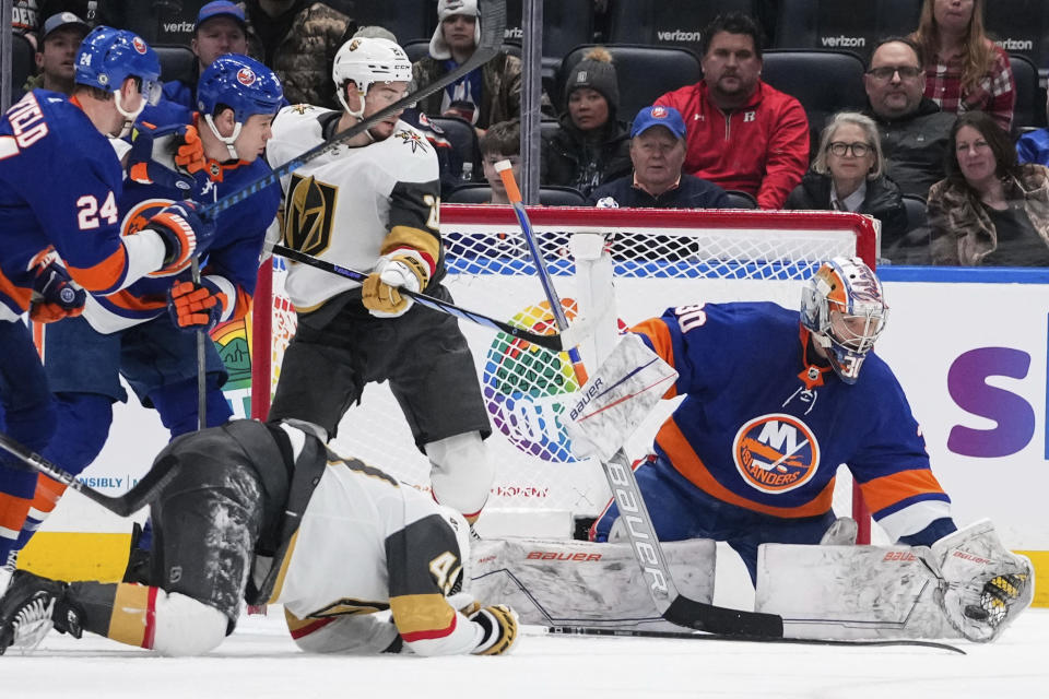 New York Islanders goaltender Ilya Sorokin (30) stops a shot during the second period of the team's NHL hockey game against the Vegas Golden Knights on Tuesday, Jan. 23, 2024, in Elmont, N.Y. (AP Photo/Frank Franklin II)