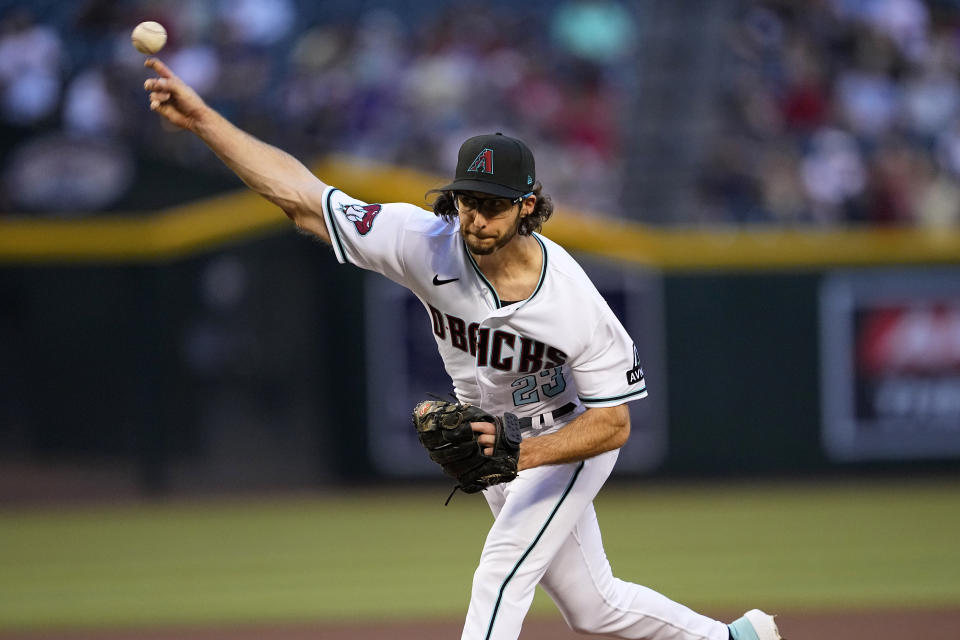 Arizona Diamondbacks starting pitcher Zac Gallen throws against the Milwaukee Brewers during the first inning of a baseball game, Monday, April 10, 2023, in Phoenix. (AP Photo/Matt York)