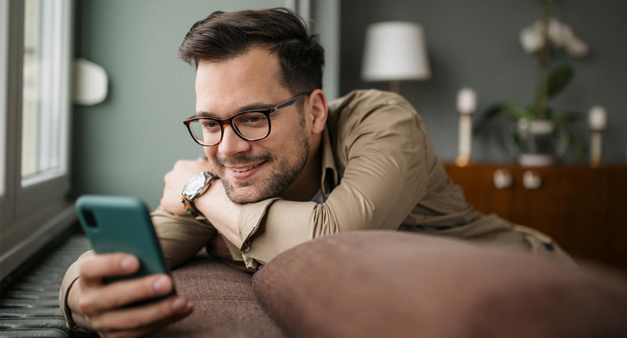 Man using LGBTQ+ dating app. (Getty Images)