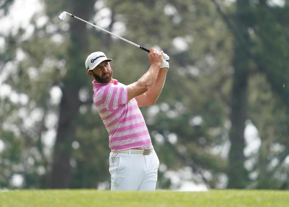Dustin Johnson hits his tee shot on the 4th hole during the first round of the Masters on April 8.