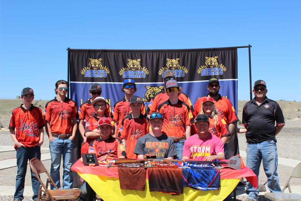 David Cloer, front row center, is pictured with other members of the Aztec High School shotgun team. Cloer has signed a letter of intent to join the trap shooting team at Simpson College in Indianola, Iowa.