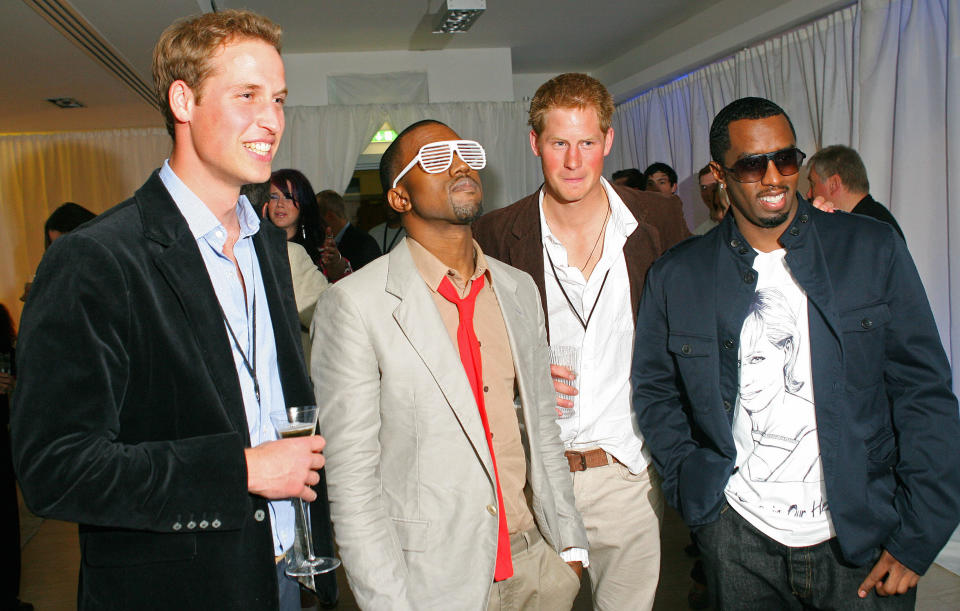 London, UNITED KINGDOM: Prince William (L), US rapper Kanye West (2nd L) Prince Harry (2nd R) and US rapper P Diddy (R) pose for the media during a backstage party at Wembley Arena in north London, 01 July 2007, as 60,000 revellers join Princes William and Harry for the six-hour long extravaganza in memory of their late mother Diana. Prince William, who turned 25 on June 21, predicted it would be "an incredible night" of music after watching preparations being made Saturday for the event which is timed for what would have been his mother's 46th birthday. WPA POOL/AFP PHOTO/CARL DE SOUZA (Photo credit should read CARL DE SOUZA/AFP via Getty Images)