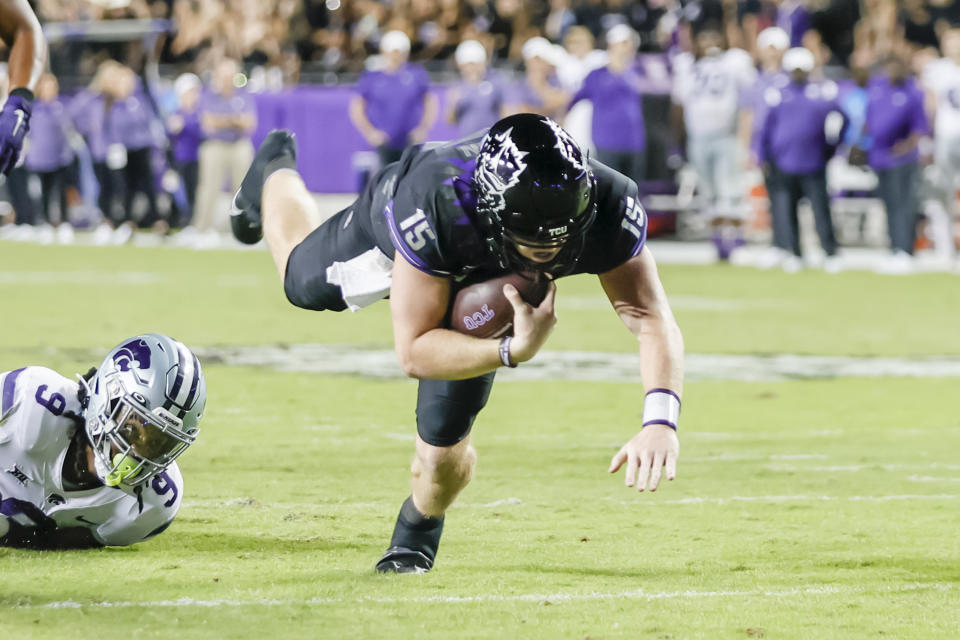 TCU Horned Frogs quarterback Max Duggan (15) dives for a first down against Kansas State on October 22, 2022 at Amon G. Carter Stadium in Fort Worth, Texas. (Photo by Matthew Pearce/Icon Sportswire via Getty Images)