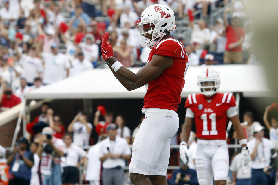 Sep 2, 2023; Oxford, Mississippi, USA; Mississippi Rebels wide receiver Tre Harris (9) counts his fingers after his fourth touchdown catch of the day during the third quarter against the Mercer Bears at Vaught-Hemingway Stadium. Mandatory Credit: Petre Thomas-USA TODAY Sports