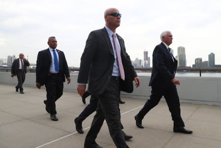 U.S. Vice-President Mike Pence walks with his security detail on the grounds of the United Nations during the 2019 United Nations Climate Action Summit at U.N. headquarters in New York City, New York, U.S.