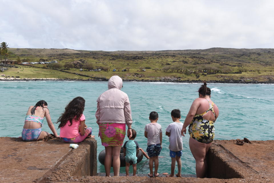 EASTER ISLAND, CHILE - 2019/09/22: Women with kids at the Anakena beach. Easter Island, also known as Rapa Nui, is an island in the Pacific Ocean belonging to Chile. The Island is famous for its moais and is a World Heritage Site by UNESCO with much of its territory within the Rapa Nui National Park. Its population is around 6,000 inhabitants. (Photo by John Milner/SOPA Images/LightRocket via Getty Images)