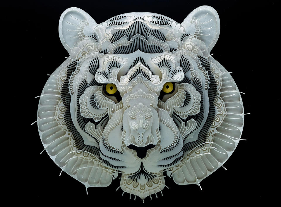 <p>Intricate paper cut out of a tiger. (Photo: Patrick Cabral/Caters News </p>